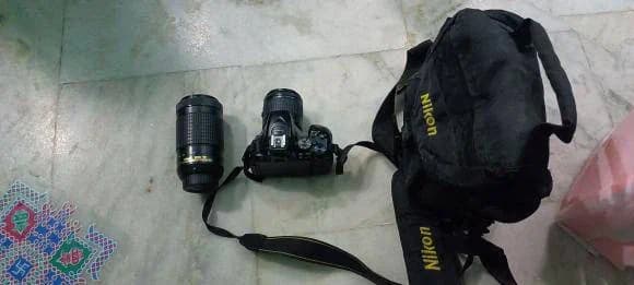 5600d camara with long lans 2batterys no charger