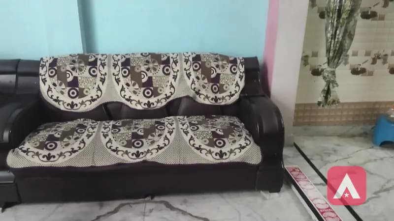brown colour sofa set for five sitters
