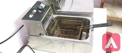 2 Fryers, Chocolate fountain with stand, Momo steamer, Oven